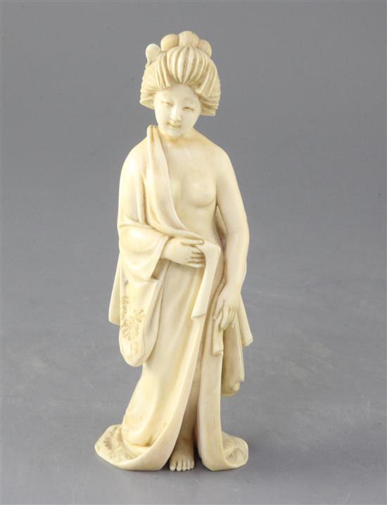 A Japanese ivory erotic figure of a bijin, early 20th century, height 18cm